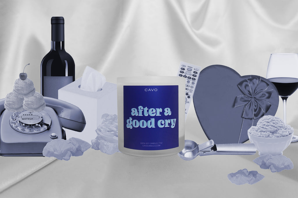 100% Soy, Vegan, Non-Toxic Black Women Owned Candle in Frosted White Jar. Royal Blue Label read "After A Good Cry" in light blue font.